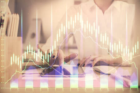 Double exposure of forex chart sketch hologram and woman holding and using a mobile device....