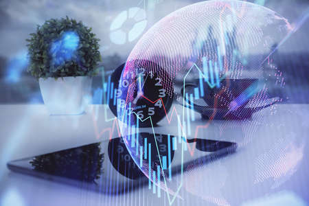 Double exposure of forex graph drawing and cell phone background. Concept of financial data analysisの写真素材
