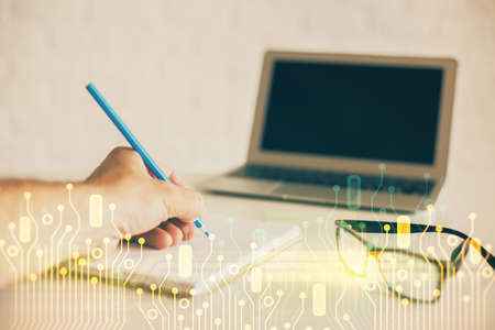 Writing man with technology icons. . Double exposure. Network and data concept.