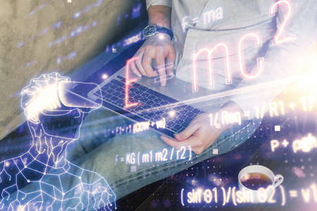 Science formula hologram with man working on computer on background. Education concept. Double...