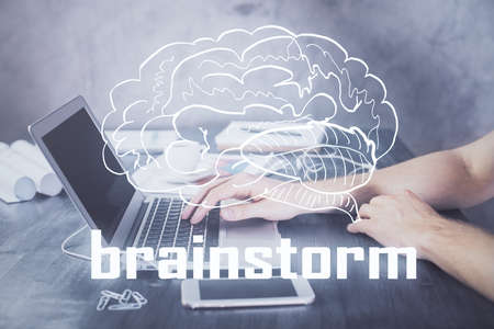 Start up drawings with businessman working on computer on background. Teamwork concept. Double...