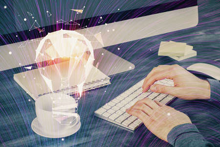 Growing arrows with businessman working on computer on background. Success concept. Double exposure.の写真素材