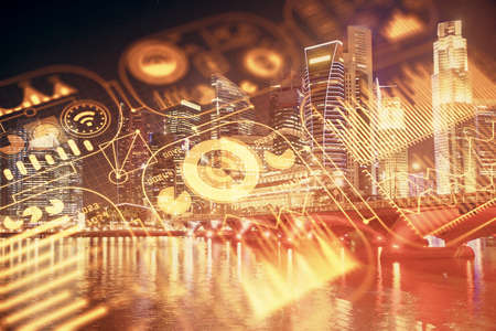 Double exposure of technology theme hologram and cityscape background. Concept of Hightech.の写真素材