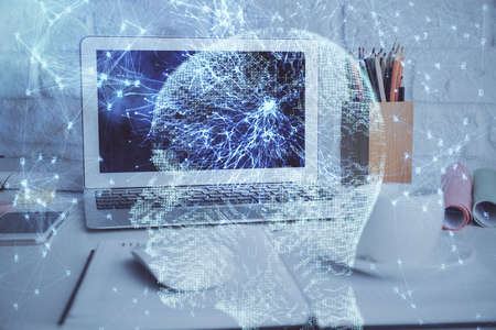 Double exposure of work space with computer and human brain drawing hologram. Brainstorm concept.の写真素材