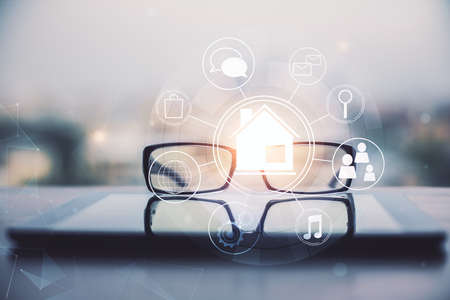 High tech appartment theme hologram with glasses on the table background. Double exposure.の写真素材