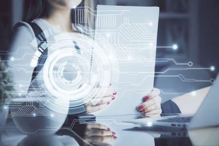 Multi exposure of womans writing hand on background with data technology hud. Big data concept.