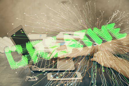 Start up drawings with businessman working on computer on background. Teamwork concept. Double exposure.の写真素材