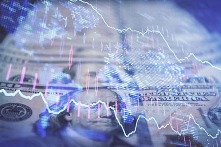 Double exposure of forex graph drawing over us dollars bill background. Concept of financial...