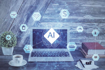 Double exposure of desktop computer and technology theme hologram. Concept of software development.