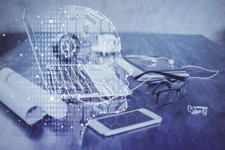 Double exposure of desktop with computer and brain drawing hologram. Artificial intelligence...