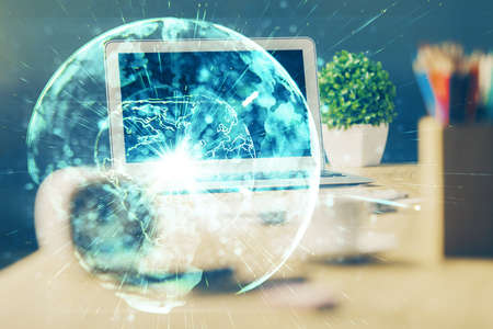 Multi exposure of business theme icons and work space with computer background. Concept of success.