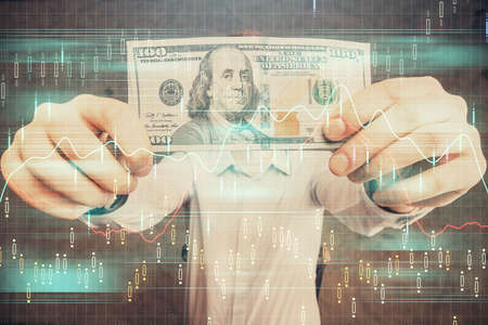 Multi exposure of forex graph drawing hologram and USA dollars bills and man hands. Technical Analysis concept.の写真素材