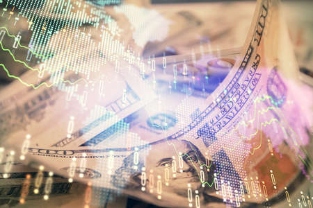 Double exposure of forex graph drawing over us dollars bill background. Concept of financial markets.の写真素材