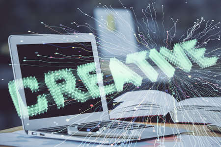 Desktop computer background in office and start up theme hologram drawing. Double exposure. Startup...