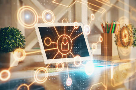 Computer on desktop with social network hologram. Double exposure. Concept of international people...