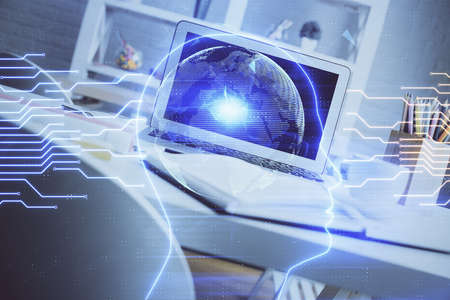 Double exposure of work space with computer and human brain drawing hologram. Brainstorm concept.