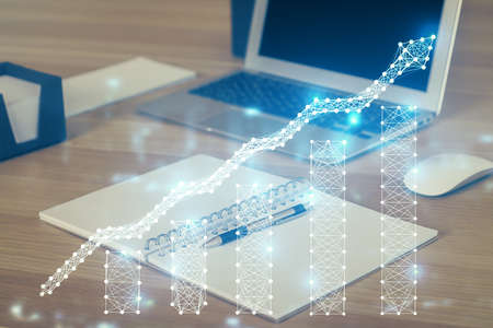 Multi exposure of chart and financial info and work space with computer background. Concept of...