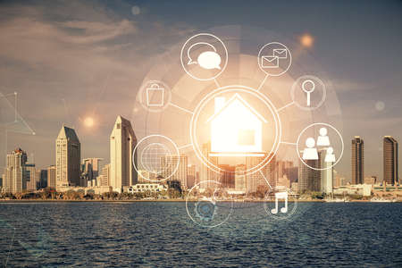 Double exposure of buildings hologram over cityscape background. Concept of smart city.