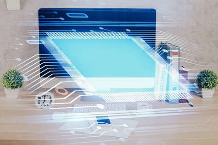 Double exposure of table with computer on background and data theme hologram. Data technology...