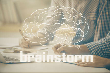 Start up drawings with businessman working on computer on background. Teamwork concept. Double exposure.の写真素材