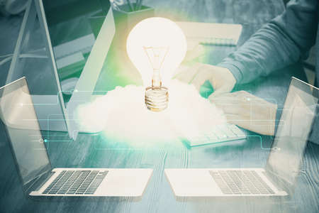 Growing arrows with businessman working on computer on background. Success concept. Double exposure.