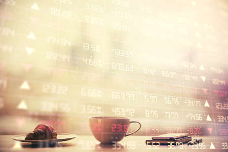 Double exposure of forex chart over coffee cup background in office. Concept of financial analysis...