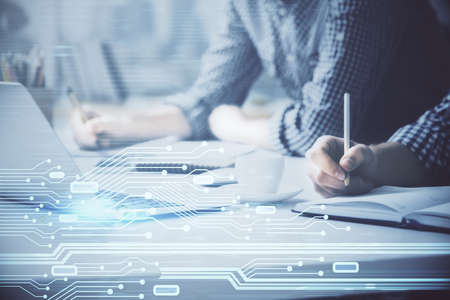 Businessman with computer background with technology theme hologram. Concept of hightech. Multi...