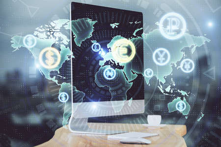 Financial chart drawing and table with computer on background. Double exposure. Concept of...