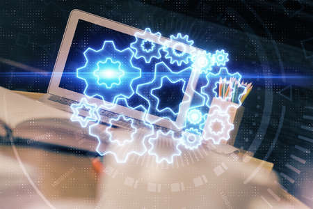 Multi exposure of business theme icons and work space with computer background. Concept of success.