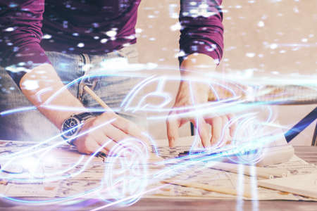 Close up of human hands background and autonomous self drive pilot vehicle concept. Multi exposure.の写真素材