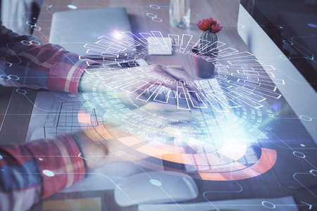 Businessman with computer background with technology theme hologram. Concept of big data. Double...