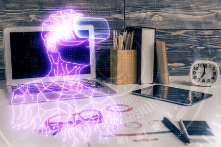 Computer on desktop with AR theme icon. Multi exposure. Concept of augmented reality.