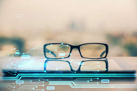 Data tech hologram with glasses on the table background. Concept of technology. Double exposure.