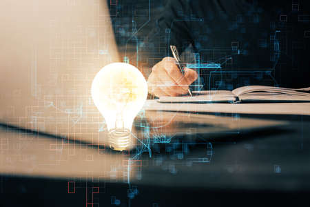 Innovative your business. Idea concept icon on writing mans hand background. Multi exposure.
