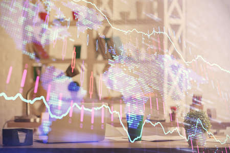 Double exposure of stock market graph drawing and office interior background. Concept of financial analysis.の写真素材