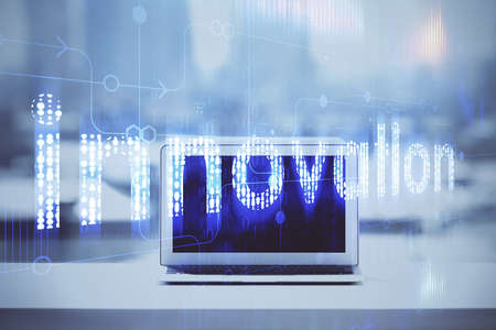Double exposure of table with computer on background and data theme drawing. Concept of innovation.