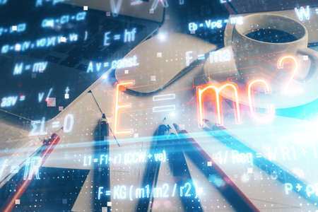 Desktop computer background and formula hologram writing. Double exposure. Education concept.