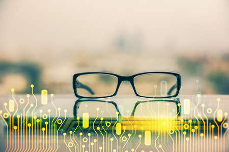 Data tech hologram with glasses on the table background. Concept of technology. Double exposure.