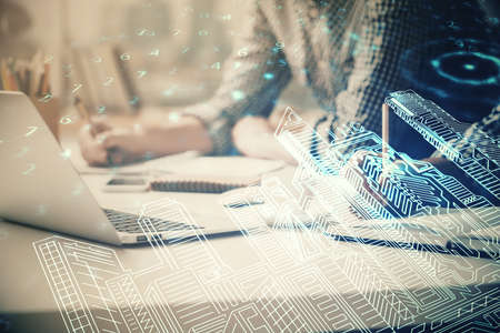 High tech city drawing with businessman working on computer on background. Smartcity concept. Double exposure.の写真素材