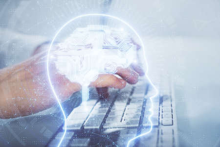 Man with computer background with brain theme hologram. Concept of brainstorm. Double exposure.の写真素材