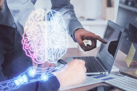 Man with computer background with brain theme hologram. Concept of brainstorm. Double exposure.