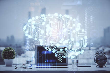Double exposure of desktop with computer and brain drawing hologram. Artificial intelligence...
