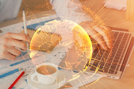 Media network theme hologram with man working on computer on background. Concept of internet...