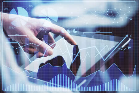 Multi exposure of mans hands holding and using a phone and financial chart drawing. Market analysis...