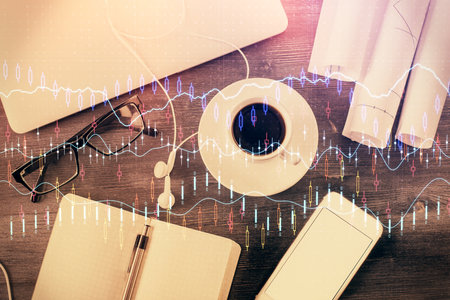 Multi exposure of forex graph drawing over desktop background with computer. Concept of financial analysis. Top view.の写真素材