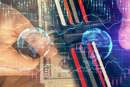 Multi exposure of forex graph drawing hologram and USA dollars bills and man hands. Technical...