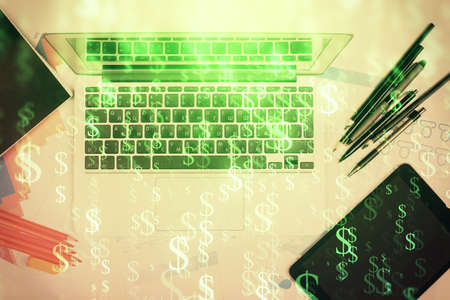 Multi exposure of forex chart drawing over table background with computer. Concept of financial...