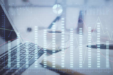 Double exposure of financial chart drawing and desktop with coffee and items on table background....