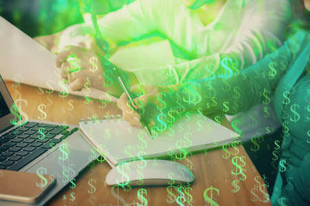 Double exposure of forex chart drawing over people taking notes background. Concept of financial...