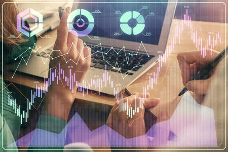 Double exposure of man and woman working together and forex chart hologram. Business concept....